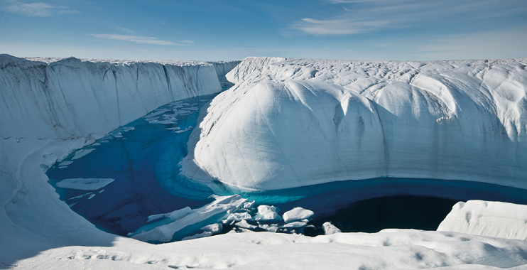 Image Description:  A photo of Ice sheets separated by a body of water, like a river in the middle.End Description